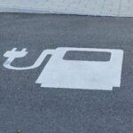 Electric vehicle charging station at the rest area Pippinger Flur (A8) - sign reserving the parking space for vehicles that need charging